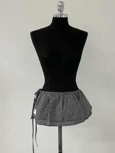 Koreaanse stijl zwart-witte gingham wikkelrok verlenging modieuze mini-rok stijlvolle