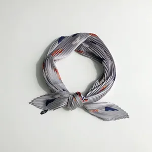Grey pleated small square scarf detail shot, elegant women neckerchief with abstract print.