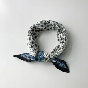 Pleated square scarf detail, vintage retro neckerchief style, elegant accessory for women.