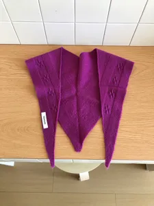 Purple knit wool triangular scarf, winter warm shawl wrap, elegant cozy fashion accessory.