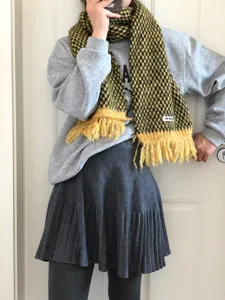 Korean style cozy colorblock tassel scarf detail, soft knit winter fashion accessory.