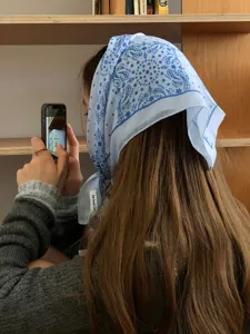 Light blue cotton bandana with paisley star pattern, stylish head wrap for daily wear.