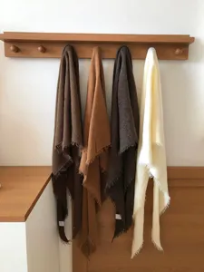 Cozy wool-blend solid color winter triangular scarf and headscarf for women warm accessory.