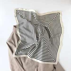 Elegant black and white geometric square silk scarf, minimalist design for women's daily wear.