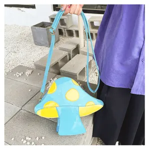 Einzigartige Pilz-Form PU Leder Umhängetasche mit blauem und gelbem Farbblock-Design.
