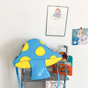 Blaue gelbe Pilz PU Umhängetasche, kreative Cartoon Schultertasche für Damen Detail.