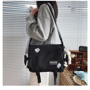 Japanese Harajuku casual student large capacity messenger crossbody bag, stylish black design.