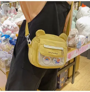Süße gelbe Bär Umhängetasche mit transparenter Vordertasche, niedliche Schülertasche.