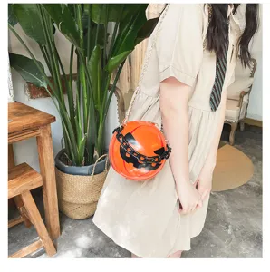 Halloween pumpkin novelty shoulder bag with acrylic chain, stylish and unique crossbody purse.