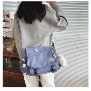 Japanese Harajuku style casual canvas messenger bag with large capacity for daily student use.