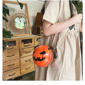 Detail view of the creative Halloween pumpkin crossbody bag with stylish chain strap for women.