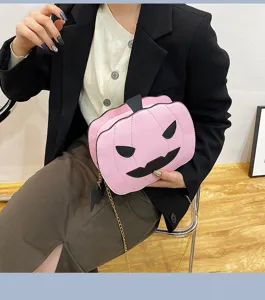 Trendy pink PU leather pumpkin crossbody bag with chain strap for women Halloween party fashion.