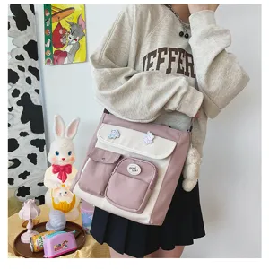 Canvas shoulder messenger bag with contrast pockets and cute daily student style view.