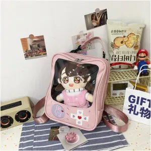 Mochila ita rosa transparente de PU linda japonesa con muñeca de peluche y control de juego