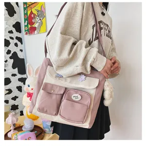Korean style vintage canvas messenger bag for student girls with multi-pockets and cute badges.