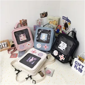 Mochila y bolso de hombro transparente de PU estilo japonés con mando de juego para estudiantes.