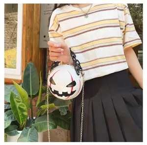 Trendy Halloween pumpkin devil spherical crossbody bag featuring chic acrylic and metal chains.