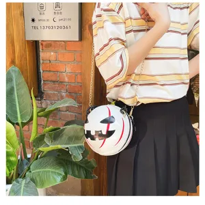 Halloween devil pumpkin round crossbody bag with chain strap, creative fashion shoulder bag.