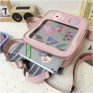 Mochila escolar rosa transparente estilo consola de juegos japonesa linda para estudiantes.