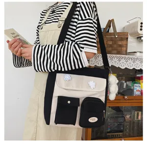 Canvas messenger bag for students, casual multi-pocket crossbody shoulder bag with cute pins.