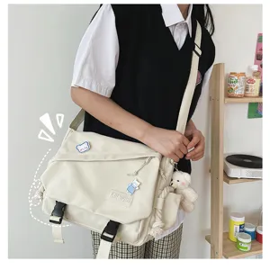 Japanese style minimalist casual canvas messenger bag for students, large capacity crossbody.