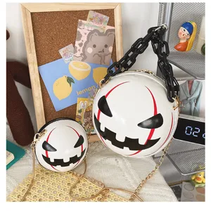 Halloween devil pumpkin round crossbody bag with chunky acrylic and gold chains for women trendy stylish