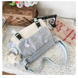 Korean ulzzang color-block messenger bag, cute student casual crossbody bag with bear pendant.