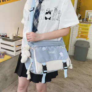 Japanese style canvas messenger bag, cute student crossbody bag with color block design for daily use.