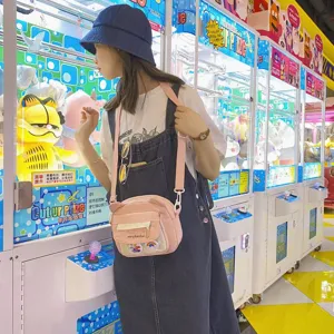 Süße japanische Vintage-Umhängetasche in Rosa mit Bärenohren, ideal für studentische Alltagslooks.