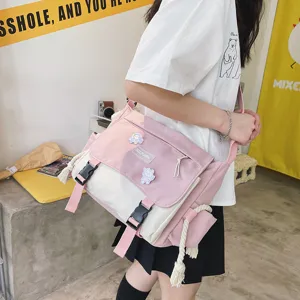 Casual color-block messenger bag for students, sweet pink and white shoulder bag details.