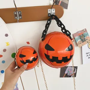 Halloween pumpkin round crossbody bag with chunky chain, funny novelty shoulder bag for women.