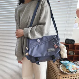 Japanese style casual student crossbody messenger bag, versatile large capacity canvas shoulder bag.