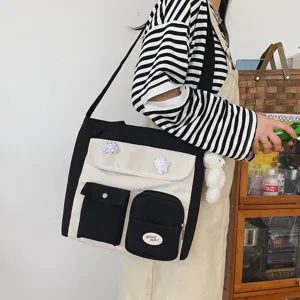 Korean style canvas messenger bag with multi-pockets, color block student shoulder bag.