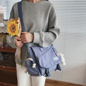 Casual Japanese style canvas messenger bag with large capacity, perfect for students daily use.