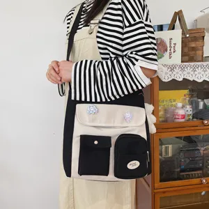 Canvas crossbody bag with multi pockets, casual retro messenger style for daily student use.