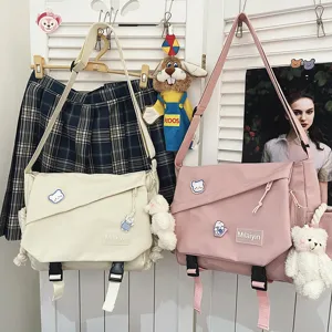 Japanese Harajuku canvas messenger bag, stylish student crossbody bag with large capacity.