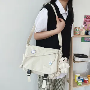 Casual Harajuku canvas messenger bag with cute bear plush pendant for daily student use