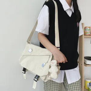 Japanese style canvas messenger bag for students, casual retro shoulder bag, large capacity.