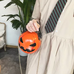Halloween pumpkin shoulder bag detail shot, creative acrylic chain design, party accessory.