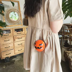 Halloween pumpkin shape crossbody bag with gold chain, funny novelty acrylic shoulder purse.
