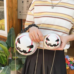 Detailed view of the funny Halloween pumpkin round crossbody bag featuring chunky acrylic chain.