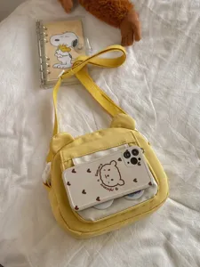 Niedliche gelbe Umhängetasche mit Bärenohren, süße Canvas-Schultertasche für Studenten.