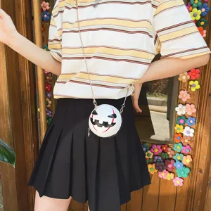 Detailed view of the Halloween pumpkin demon round crossbody bag with chain strap and cute design.