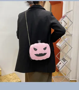 Cute pink Halloween pumpkin crossbody bag with metal chain strap for women trendy purse