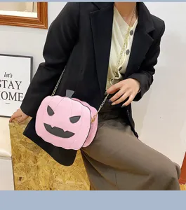Trendy PU leather pumpkin shoulder bag for women, funny Halloween crossbody bag with chain strap.