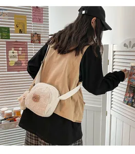 Cute lamb wool crossbody bag featuring a fluffy bear design and soft textured fabric for women.