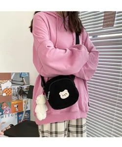 Cute black sherpa crossbody bag, sweet fuzzy shoulder bag with cute bear charm for women.