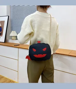Halloween pumpkin crossbody bag, stylish PU leather devil shoulder bag for women and girls.