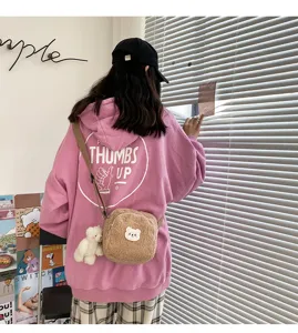 Cute vintage style fluffy bear crossbody bag and pink hoodie set, soft plush winter shoulder bag.