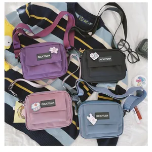 Bolso bandolera de lona estilo Harajuku para mujer, bolso pequeño informal multicolor.